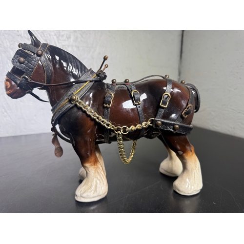 595 - Pair of Beswick-Style Shire Horses with Full Harness (Shipping Available).

A charming pair of ceram... 