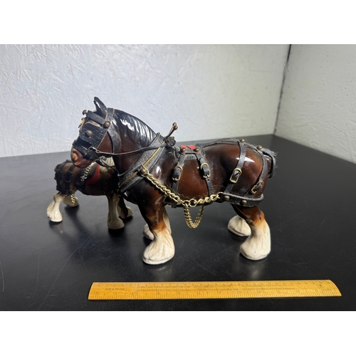 595 - Pair of Beswick-Style Shire Horses with Full Harness (Shipping Available).

A charming pair of ceram... 