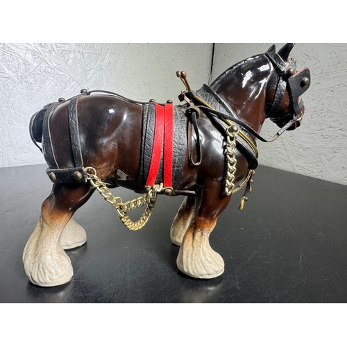 595 - Pair of Beswick-Style Shire Horses with Full Harness (Shipping Available).

A charming pair of ceram... 