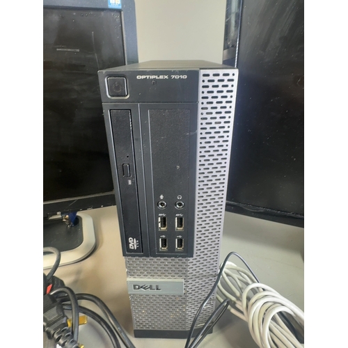 A Dell OptiPlex 7010 SFF Desktop Computer Setup with Dual Monitors and ...