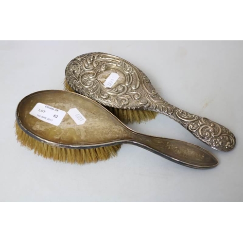 62 - Two silver backed hair brushes