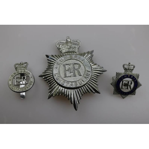 192 - An Obsolete Cumbria constabulary helmet badge together with Obsolete collar badge and one enamel cap... 