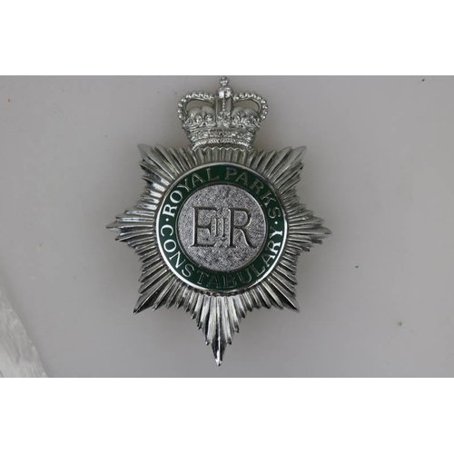 196 - An Obsolete Royal Parks Constabulary enamel centre helmet badge