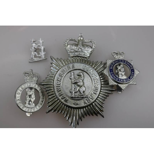 197 - An obsolete Warwickshire Constabulary helmet badge together with obsolete Warwickshire Constabulary ... 