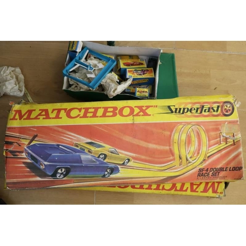 217 - A selection of matchbox cars and empty boxes together with matchbox sf4 race set and an sf5 (uncheck... 