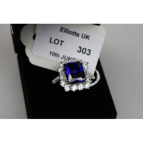 303 - A 925 Faux tanzanite and CZ cocktail ring