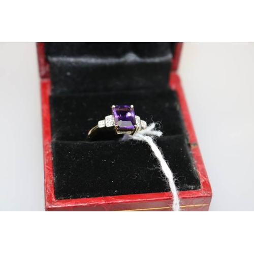 311 - A 9K Amethyst Emerald Cut diamond deco style ring