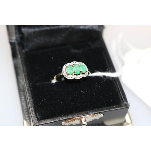 315 - A 9k three oval Emerald and Diamond ring