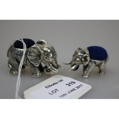 319 - Two novelty 925 and sterling marked Elephant pin cushions