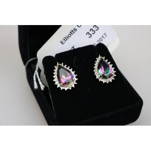 333 - A pair of 9k Gold Mystic Topaz & Diamond Earrings