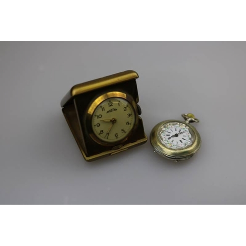 388 - A decorative travel clock together with a enamel faced pocket watch