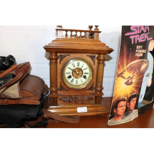 539 - An Antique walnut mantle clock