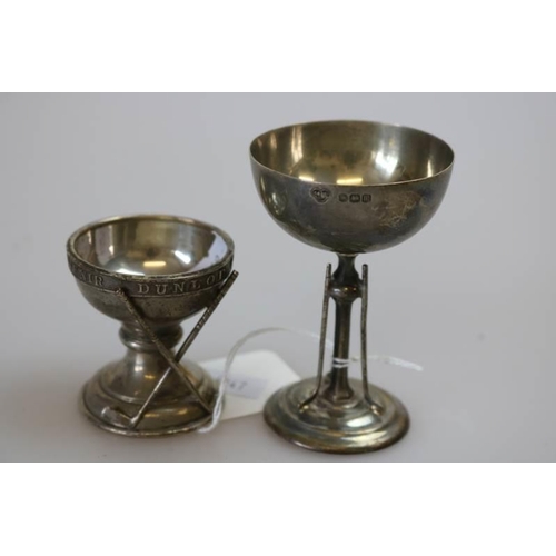 67 - Two silver miniature golfing trophies, Dunlop Golfball hole in one souvenir and Twyford Cup 1929.