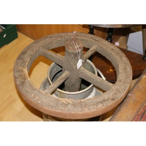 545 - A vintage wooden and metal wheel