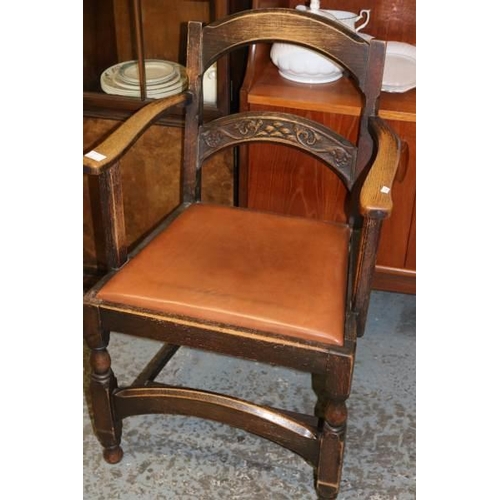 548 - An Oak Elbow chair