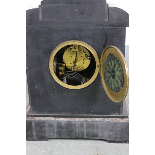 403 - An Antique Slate cased mantle clock.  Approximately 45cm tall.