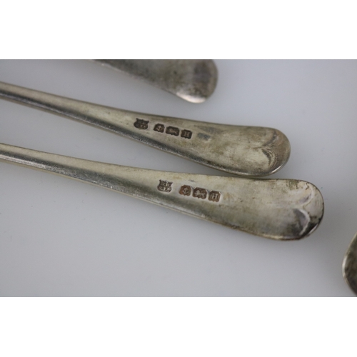 81 - A good selection of silver spoons together with a ladle and two silver souvenir spoons