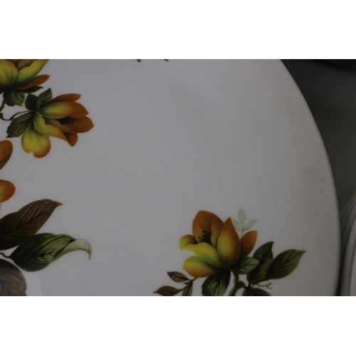 89 - A large quantity of Midwinter Magnolia pattern tea and dinnerware.  Noted some heavy crazing to a fe... 