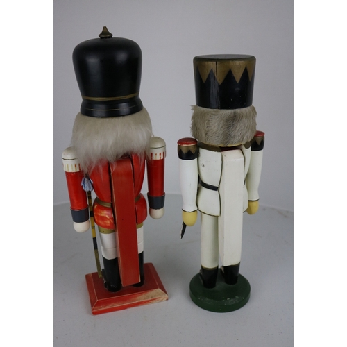 179 - Two German? wooden painted Nutcracker figures approx 12