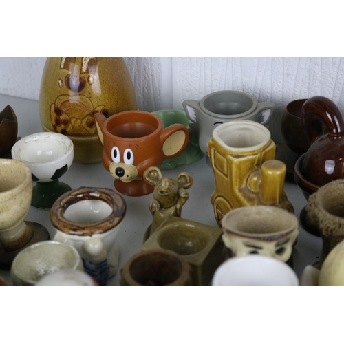 214 - Large collection of assorted egg cups