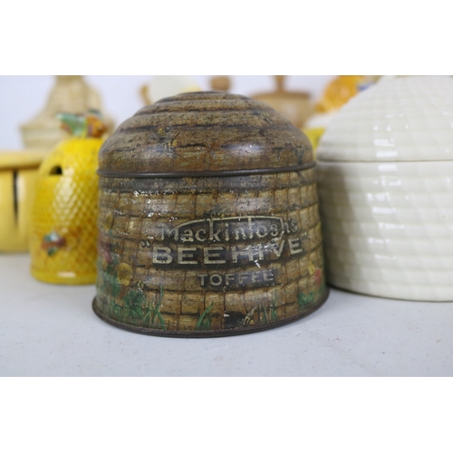 220 - A large collection of Honey Pots to include Mackintosh tin