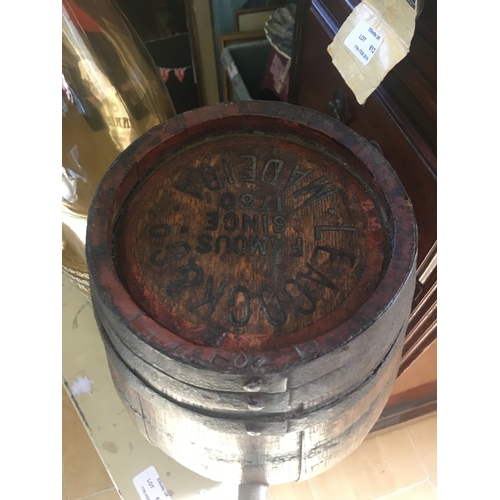 669 - A vintage wooden barrel together with an empty Champagne bottle