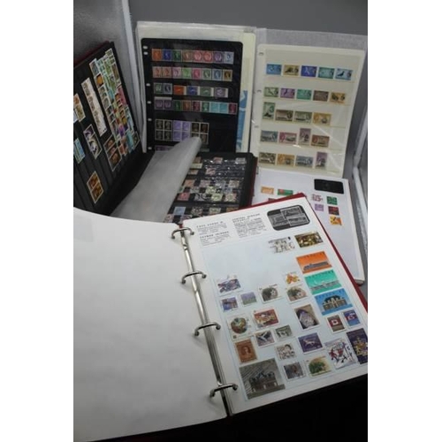 45 - Carton of world stamps including 2 Worldex albums, a large stockbook and some on large stockcards, p... 