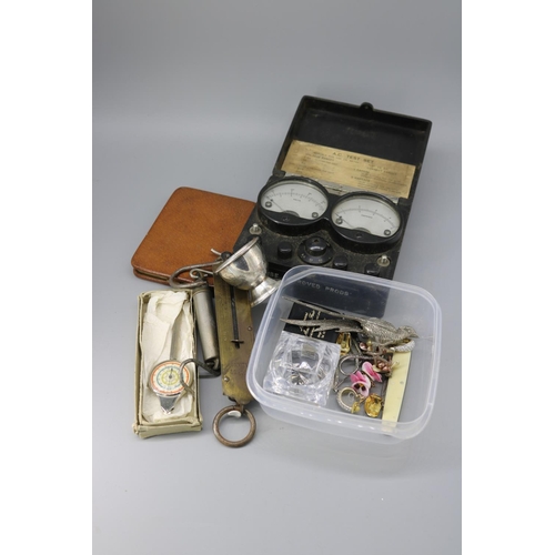 116 - A carton of collectables to include Map measure, two pocket balances, cased A.C test set, cigar case... 