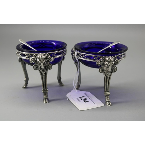 124 - A pair of antique silver salt stands with blue liner inserts with later silver spoons