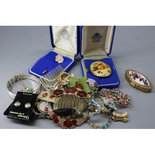 296 - A small quantity of costume jewellery together with a silver bangle