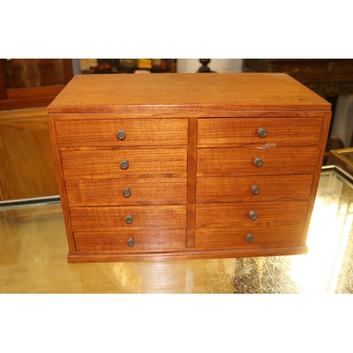 1028 - A large quantity of sewing accessories housed in a multi drawer chest