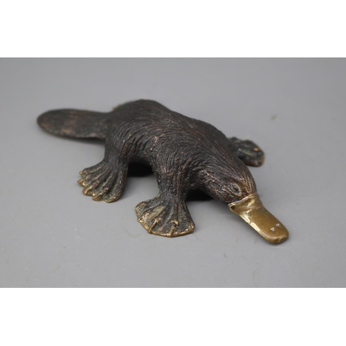 201 - A Mary Michelmore Australia duckbilled platypus signed to base, measures approx 12cm long