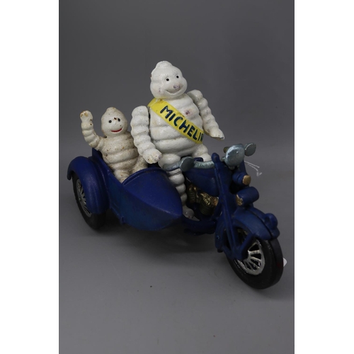 210 - Michelin men on motorbike with sidecar