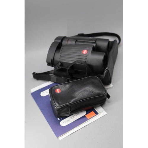 181 - A Leica 8x42 BA Binoculars together with smaller Leica pair of binoculars and original receipt and L... 