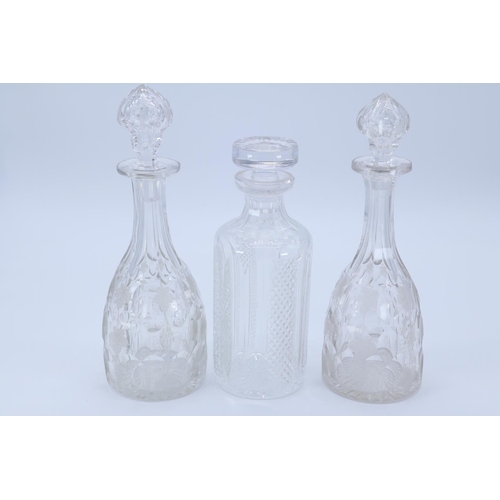 4 - Two similar quality cut glass decanters with fine etched vine decoration. Approx. 12