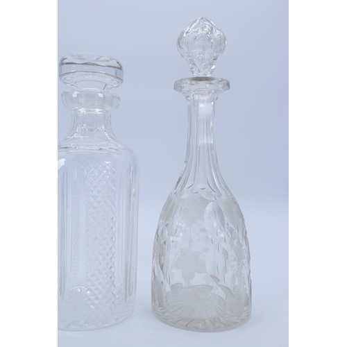 4 - Two similar quality cut glass decanters with fine etched vine decoration. Approx. 12