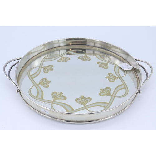 108 - A silver plated mirrored tray designed by Monica Backstrom