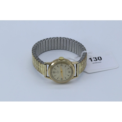 130 - Tudor Royal shock resisting watch in 9ct gold case on expanding bracelet (not gold), working at time... 