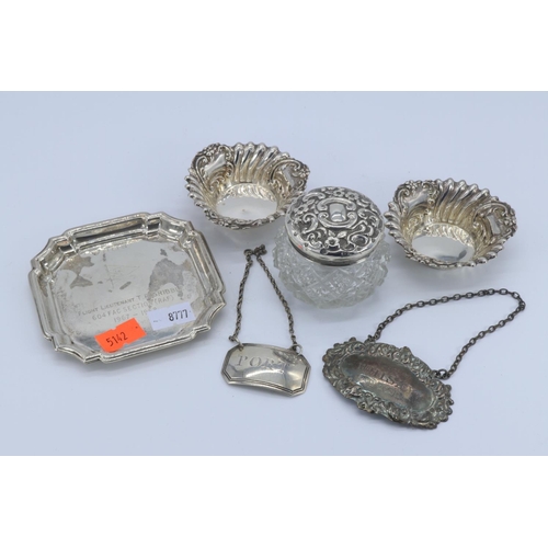 44 - Silver ashtray inscribed together with pair of silver salts, silver lidded pot and two silver bottle... 