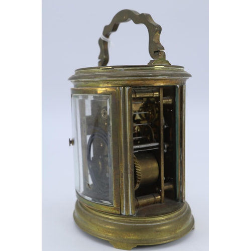 68 - Brass cased oval carriage clock a/f (measures approx 5