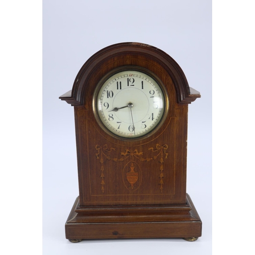 75 - Edwardian Mantle clock with chip to front of wood, key inside (measures approx 10.5