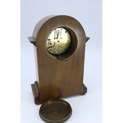 75 - Edwardian Mantle clock with chip to front of wood, key inside (measures approx 10.5