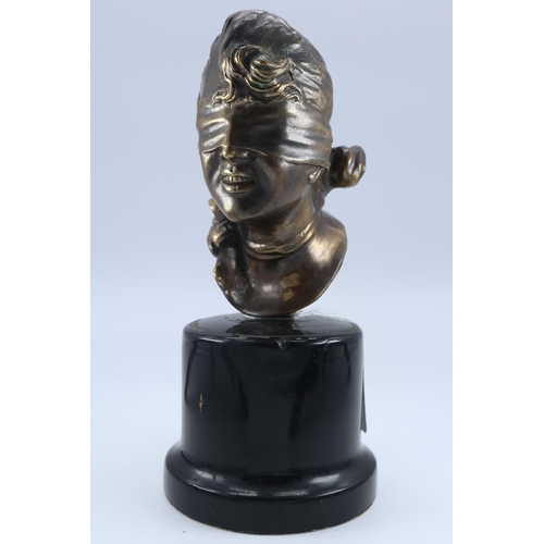 79 - A bronze bust unsigned stamped 7, 