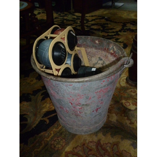 776 - A galvanised fire bucket together with boules etc