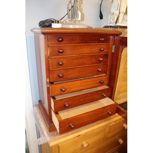 282 - A Collectors chest with drawers enclosed by glazed door measuring approx. 55cm high x 29cm depth x 4... 