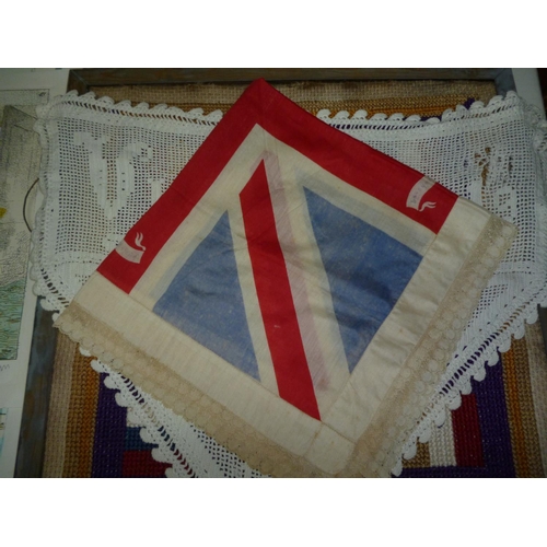 218a - An interesting lot containing a needlework panel from 1916 depicting flags of nations and bearing R.... 