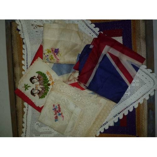 218a - An interesting lot containing a needlework panel from 1916 depicting flags of nations and bearing R.... 