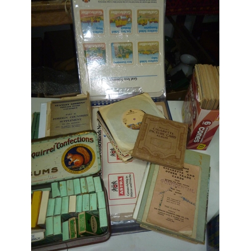 299 - An album of beer mat samples and beer mats (unused), a stamp album, mecano magazines and some 45 rec... 