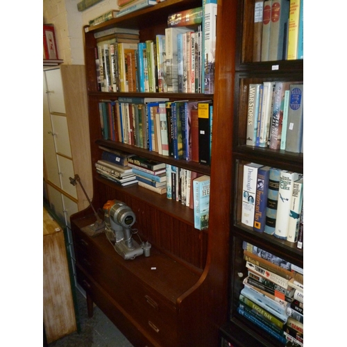 767 - Danish wall unit fitted shelves over drawer base with mid section tambour fronted doors (one drawer ... 