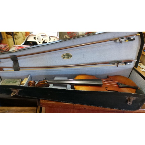 72 - A Full size violin in a Rushworth and Dreaper in fitted case with two bows one marked Roth Glasser.